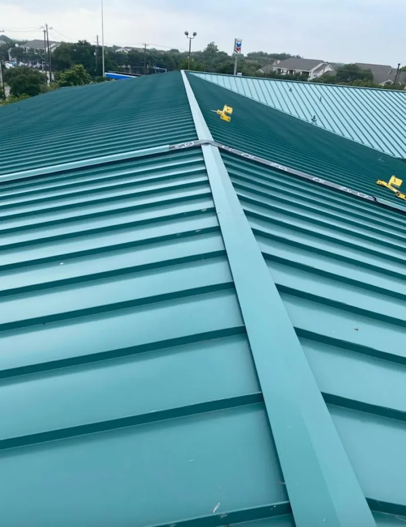 Green commercial metal roof ridge and valley for Metal Roof Repair in Mount Airy